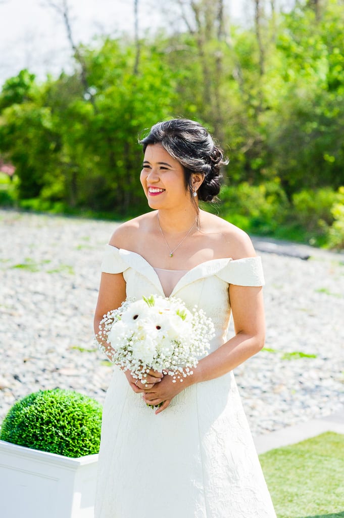 Bride in ivory gown off the shoulder