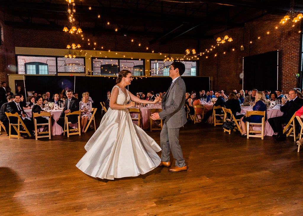 bride twirls during first dance