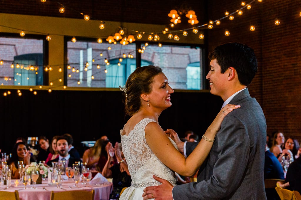 Bride and Groom smiling during first dance