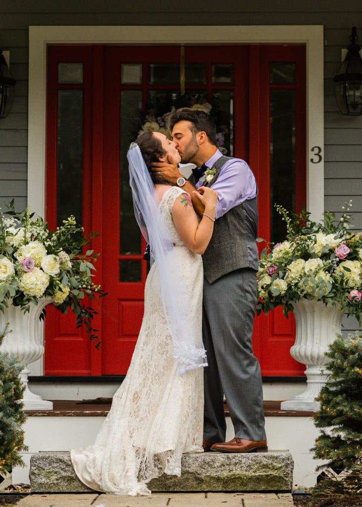 Bride and Groom first kiss on Porch elopement